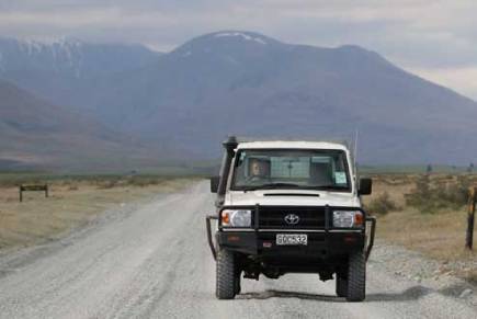 Ute Driving On Country Road